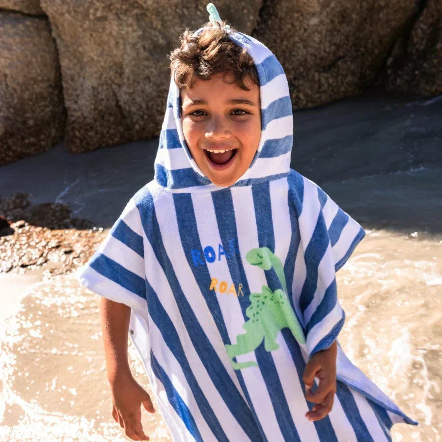 Why do children feel so snuggly in a beach poncho?