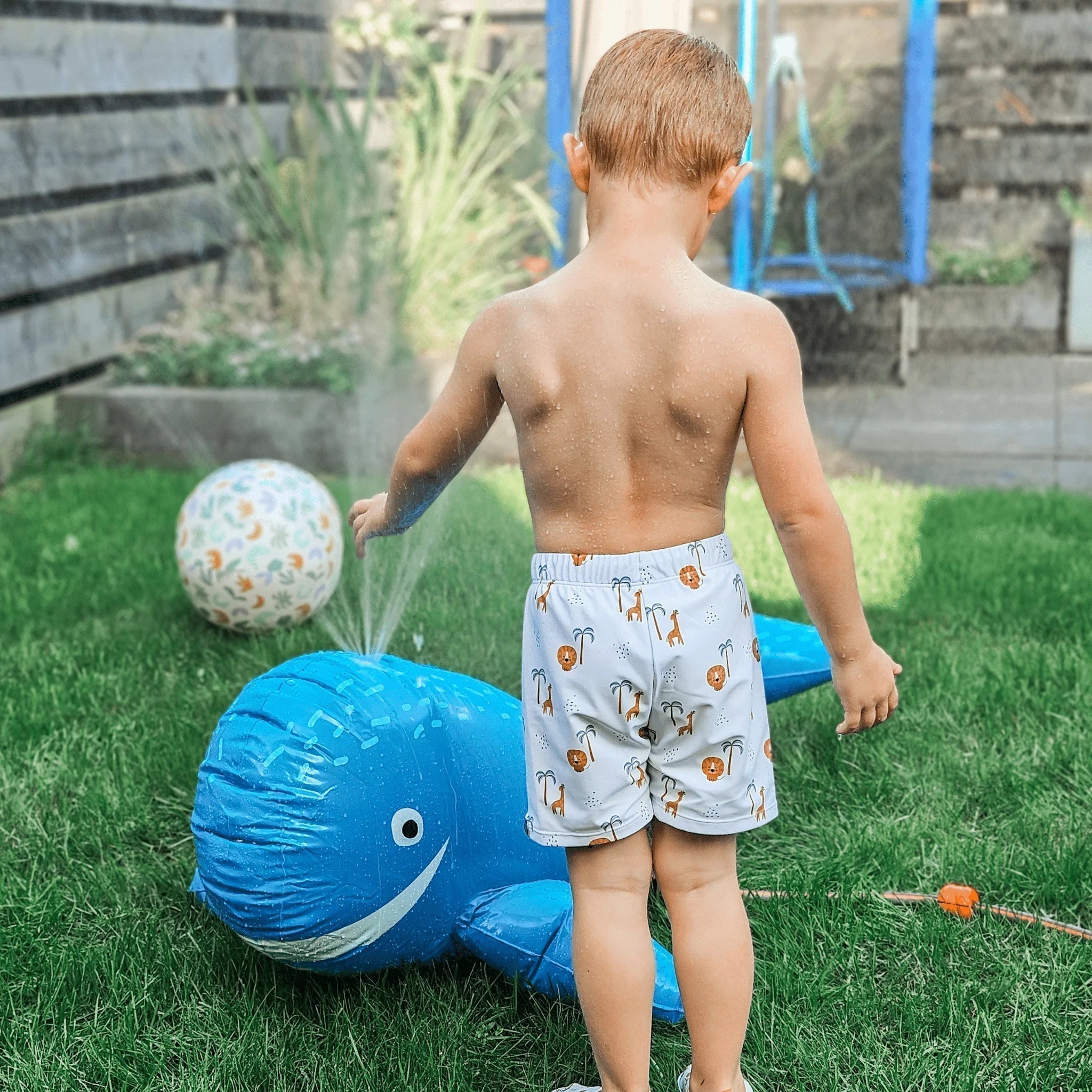 Use the playmat water sprayer as a sensory activity for your kid